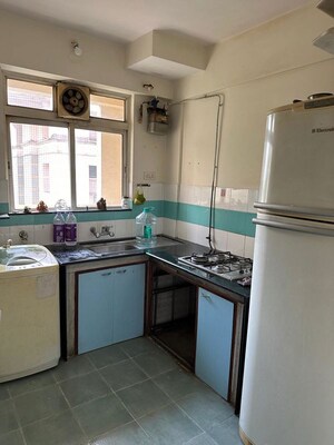 Kitchen in 2 BHK Apartment at Anant Metropolis Insignia Towers, Kasarvadavali – for Rent