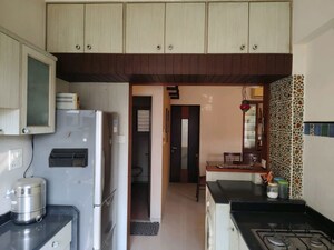 Kitchen in 2 BHK Apartment at Metropolis Rivera, Kasarvadavali – for Rent