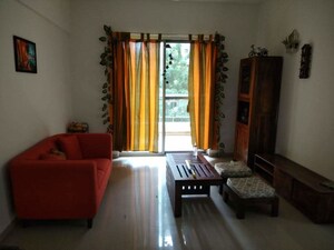 Living Room in 2 BHK Apartment at Sucasa CHSL, Wakad – for Rent