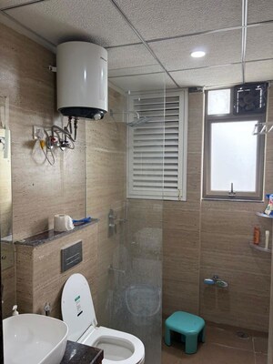 Bathroom in 3 BHK Apartment at Manglam 14 Woodland Park, Shiprapath – for Rent