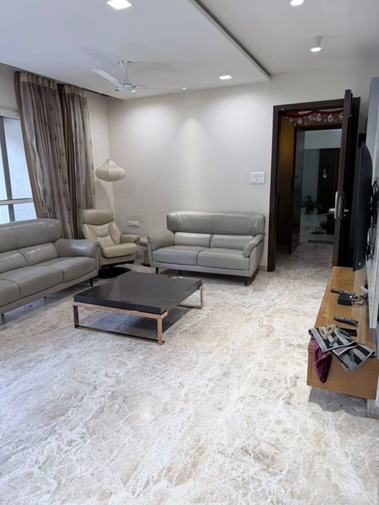 Living Room, mantra-monarch 3 Bedroom 1200 Sq.Ft. Apartment In Balewadi Pune 10565972