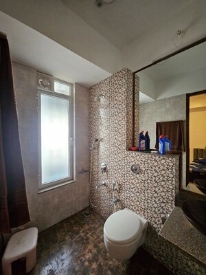 Bathroom in 3 BHK Apartment at Omkar Alta Monte, Malad East – for Rent