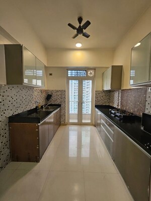 Kitchen in 3 BHK Apartment at Omkar Alta Monte, Malad East – for Rent