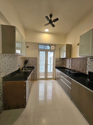 Kitchen in 3 BHK Apartment at Omkar Alta Monte, Malad East – for Rent