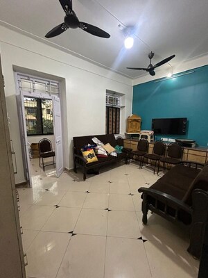 Living Room in 1 BHK Apartment at Khar West – for Rent