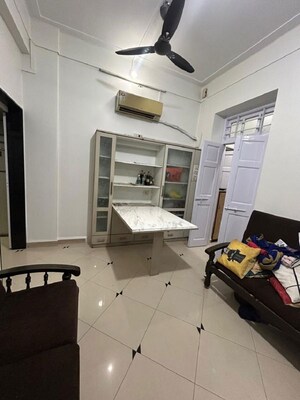 Living Room in 1 BHK Apartment at Khar West – for Rent