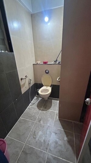 Bathroom in 2 BHK Apartment at Woodsville township, Moshi – for Rent