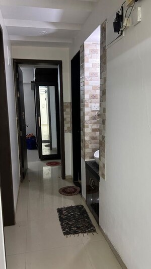 Building Lobby in 2 BHK Apartment at Woodsville township, Moshi – for Rent