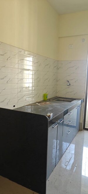 Kitchen in 1 BHK Apartment at Puranik City, Kasarvadavali – for Rent