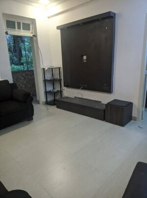 Living Room in 1.5 BHK Apartment at Bandra West – for Rent