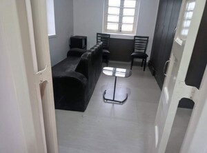 Living Room in 1.5 BHK Apartment at Bandra West – for Rent