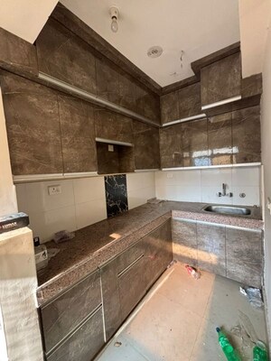 Kitchen in 2 BHK Apartment at Supertech Eco Village II, Sector 16b Greater Noida – for Rent