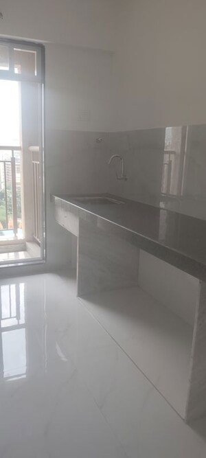 Kitchen in 1 BHK Apartment at Anant Metropolis Insignia Towers, Kasarvadavali – for Rent