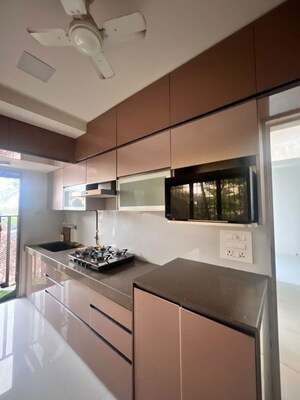 Kitchen in 1 BHK Apartment at Yari Road – for Rent