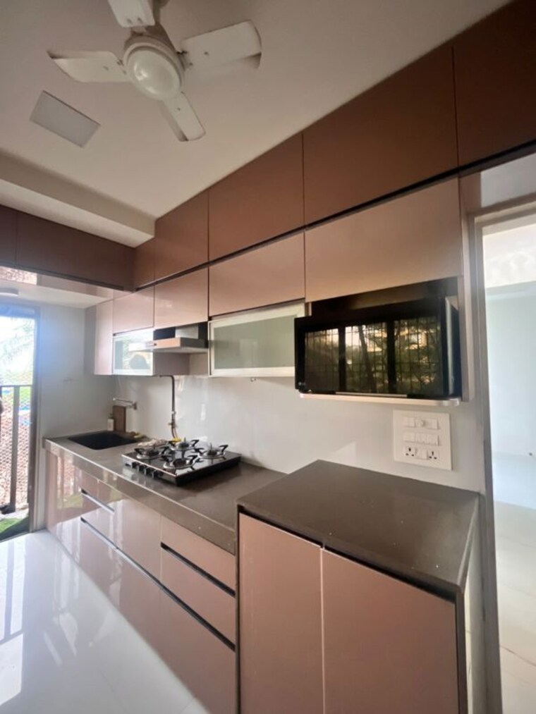 Kitchen, yari road 1 Bedroom 550 Sq.Ft. Apartment In Yari Road Mumbai 10528931