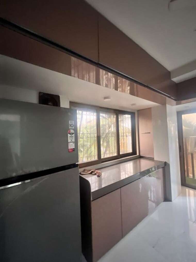 Kitchen, yari road 1 Bedroom 550 Sq.Ft. Apartment In Yari Road Mumbai 10528931