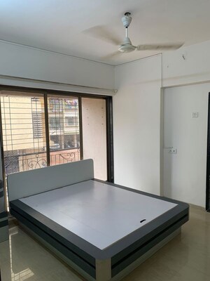 Bedroom in 3 BHK Apartment at Right Channel Trishul Heights, Kandivali West – for Rent