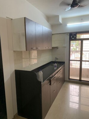 Kitchen in 3 BHK Apartment at Right Channel Trishul Heights, Kandivali West – for Rent