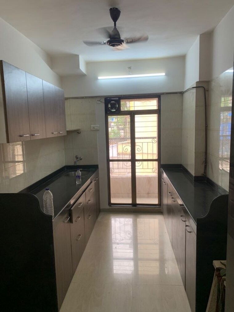 Kitchen, right-channel-trishul-heights 3 Bedroom 1000 Sq.Ft. Apartment In Kandivali West Mumbai 10566203