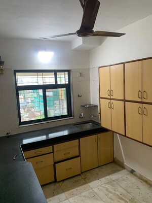 Kitchen in 3 BHK Apartment at Soni Tower CHS, Borivali West – for Rent