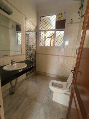 Bathroom in 4 BHK Builder Floor at Gulmohar Park – for Rent
