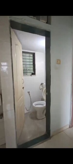 Bathroom in 1 BHK Apartment at Porwal Tower, Mira Road – for Rent