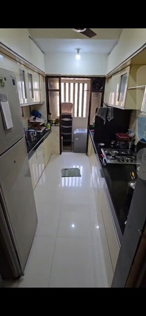 Kitchen in 2 BHK Apartment at Evershine Cosmic, Andheri West – for Rent