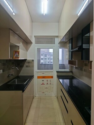 Kitchen in 3 BHK Apartment at Godrej Aqua, International Airport Road – for Rent