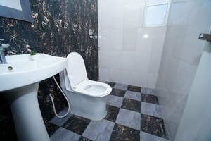 Bathroom in 3 BHK Apartment at Migsun Twinz, Eta Ii Greater Noida – for Sale