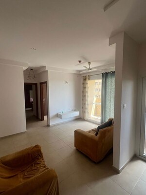Living Room in 2.5 BHK Apartment at Bhartiya Nikoo Homes, Thanisandra Main Road – for Rent