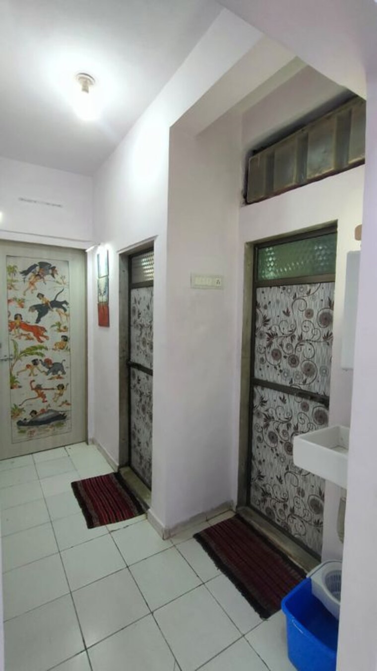 Living Room, mansarovar-regency-chs 1 Bedroom 625 Sq.Ft. Apartment In Mira Road Thane 10567570