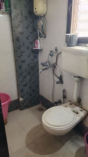 Bathroom in 1 BHK Apartment at Mansarovar Regency CHS, Mira Road – for Rent