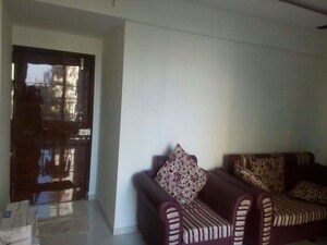 Living Room in 2 BHK Apartment at Aksha Vrundavan, Chikhali – for Rent