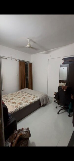 Bedroom in 2 BHK Apartment at Aksha Vrundavan, Chikhali – for Rent