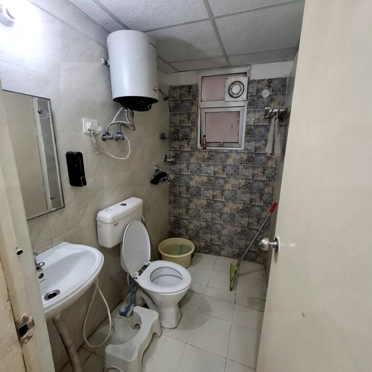 Bathroom, signature-global-the-millennia 2 Bedroom 850 Sq.Ft. Apartment In Sector 37d Gurgaon 10567625