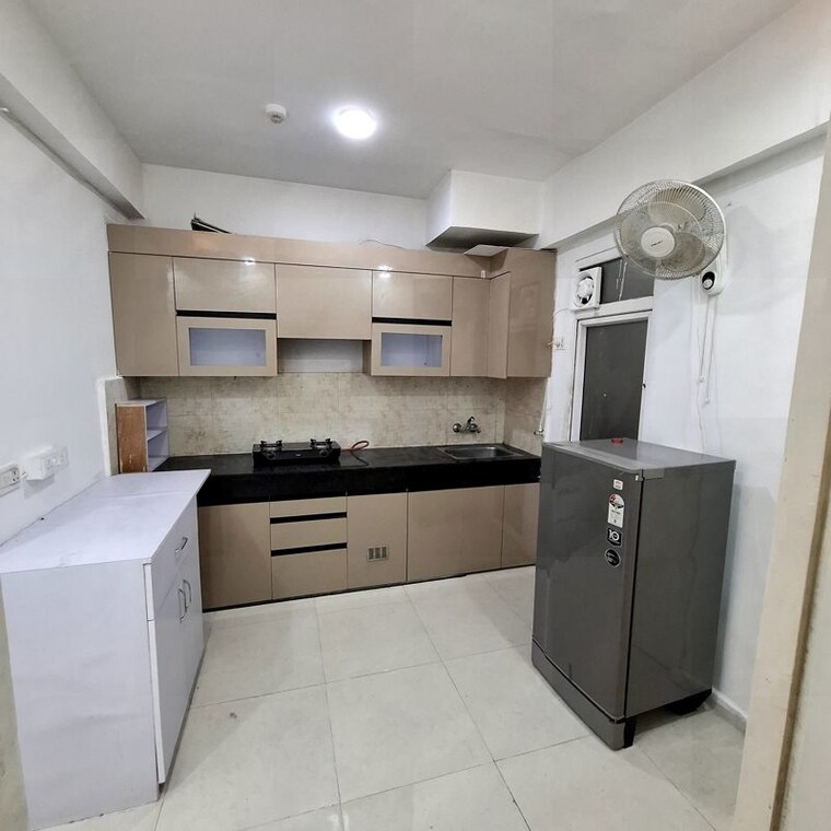 Kitchen, signature-global-the-millennia 2 Bedroom 850 Sq.Ft. Apartment In Sector 37d Gurgaon 10567625