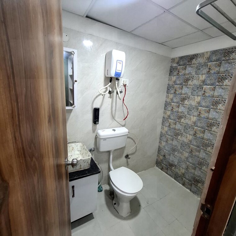 Bathroom, signature-global-the-millennia 2 Bedroom 850 Sq.Ft. Apartment In Sector 37d Gurgaon 10567633