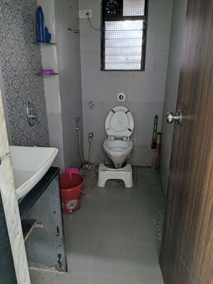 Bathroom in 2 BHK Apartment at Dattani Shreeji Sharan, Kandivali West – for Rent