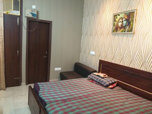 Bedroom in 3 BHK Builder Floor at Dhakoli – for Rent