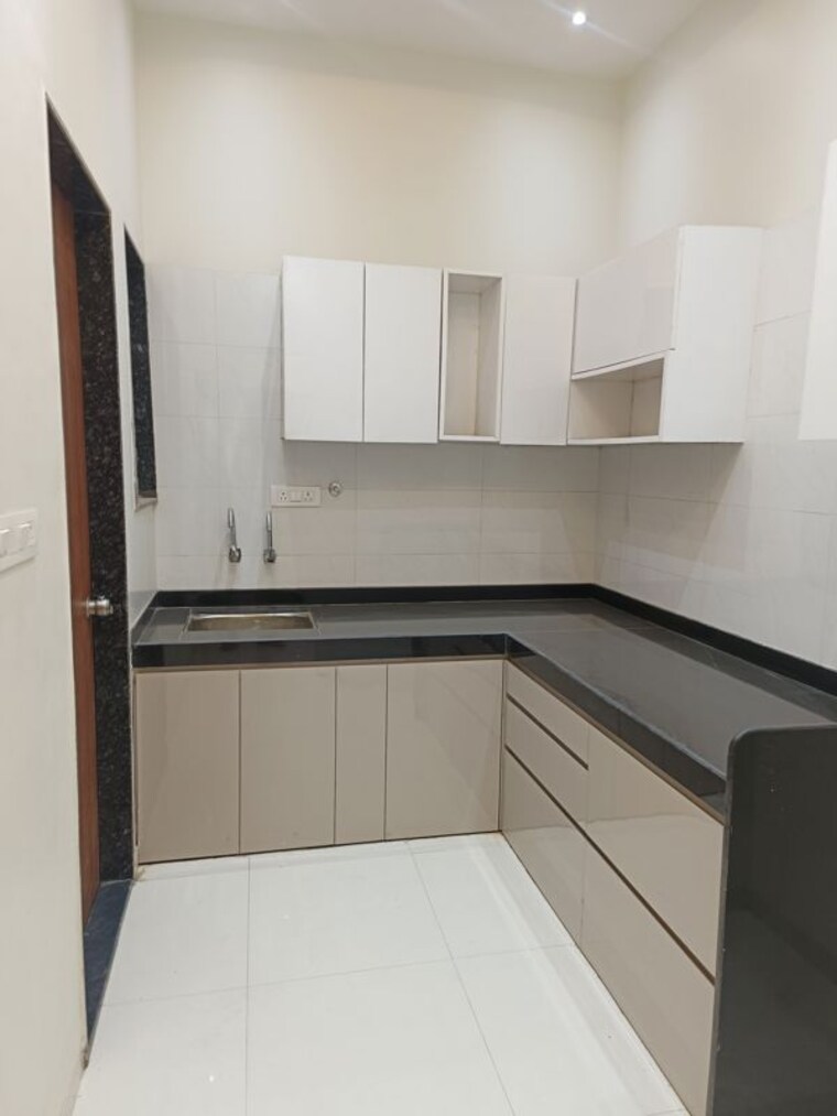 Kitchen, ishwar-parmar-river-residency 2 Bedroom 721 Sq.Ft. Apartment In Chikhali Pune 10567769