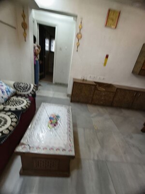 Bedroom in 2 BHK Apartment at Satellite Garden, Goregaon East – for Rent