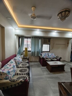Living Room in 2 BHK Apartment at Satellite Garden, Goregaon East – for Rent