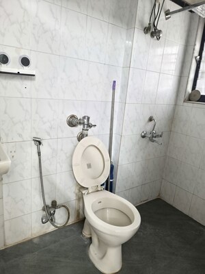Bathroom in 2 BHK Apartment at Satellite Garden, Goregaon East – for Rent
