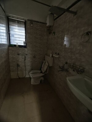Bathroom in 2 BHK Apartment at Satellite Garden, Goregaon East – for Rent