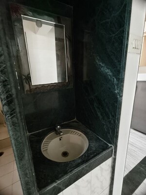 Bathroom in 2 BHK Apartment at Sankalp II, Malad East – for Rent