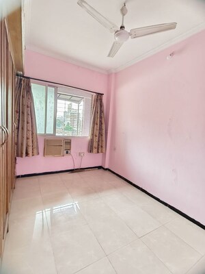 Room in 2 BHK Apartment at Riddhi Garden, Malad East – for Rent