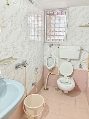 Bathroom in 2 BHK Apartment at Riddhi Garden, Malad East – for Rent