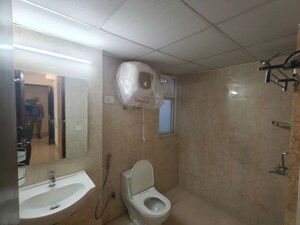 Bathroom in 3 BHK Apartment at Godrej Woods, Sector 43 – for Rent