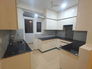 Kitchen in 3 BHK Apartment at Godrej Woods, Sector 43 – for Rent