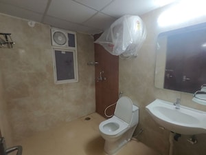 Bathroom in 3 BHK Apartment at Godrej Woods, Sector 43 – for Rent